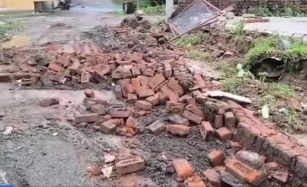 Wall Collapse in Rain