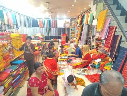 Hartalika Teej: Crowd of women at shops selling clothes, cosmetics and puja materials