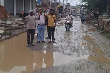 Road dug up and left for 20 days, villagers protest