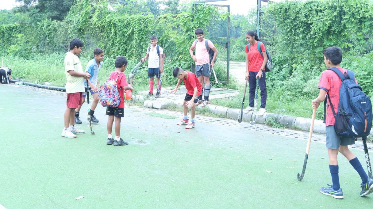 Waterlogging in the hockey ground increased trouble, players slipped and fell