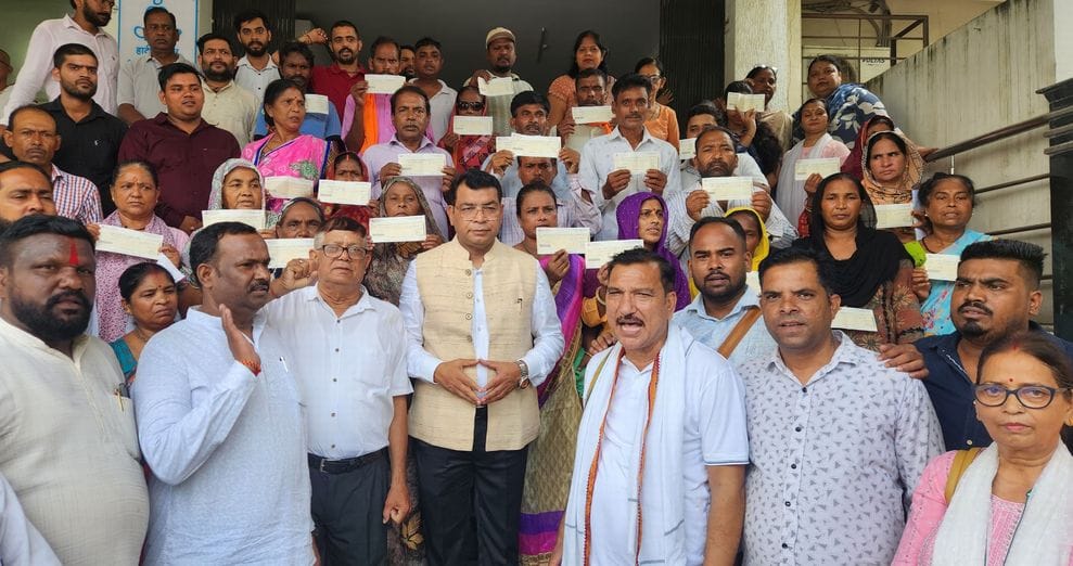 MLA Distributes Check