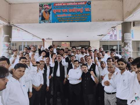 Advocates staged a protest after a report was filed against their colleague