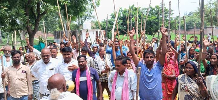 Villagers protest against the lease of the pond