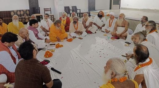 There is a dispute between saints and officers regarding development in Dharmnagari