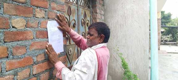 The irrigation department pasted a notice to vacate the land