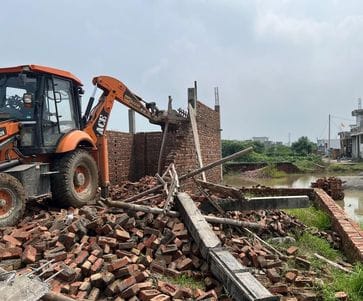Houses and roads under construction in three illegal colonies demolished