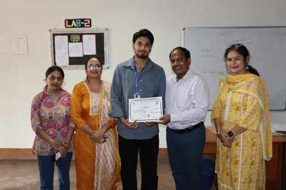 Isha and Nancy won the tech poster making competition