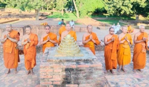 Followers offer prayers at Ananda Bodhi