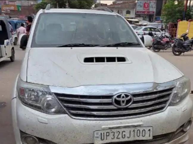 SUV looted and employee thrown out of moving vehicle