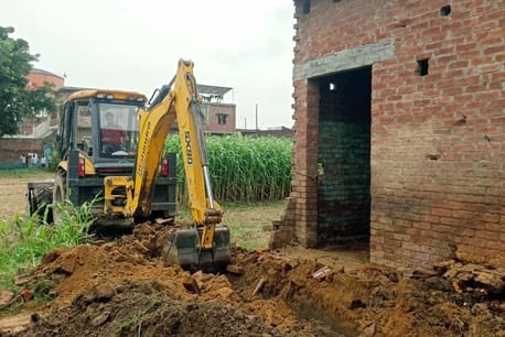 Government land freed from encroachment by running bulldozer, MRF center will be built