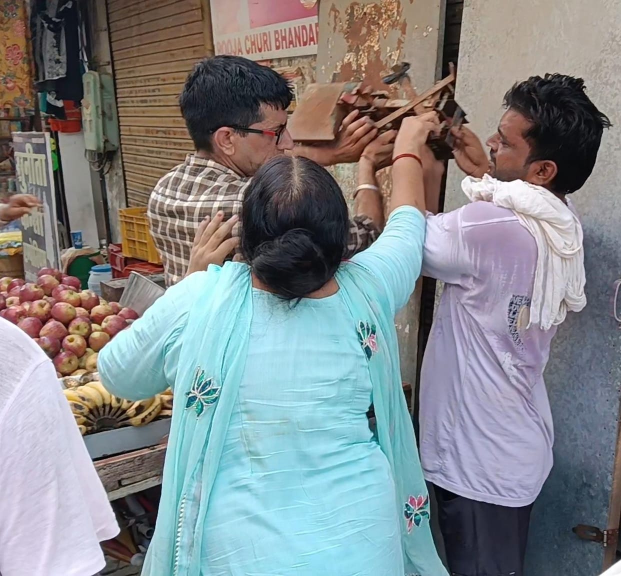 Amid protest, a crackdown on encroachments... goods seized from 10 shops and 5 carts.