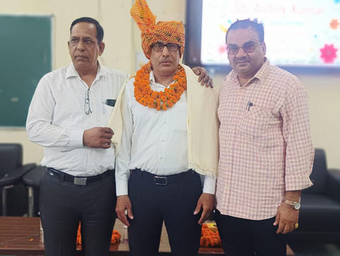 Instructor Ashok Kumar retired, honoured with a memento