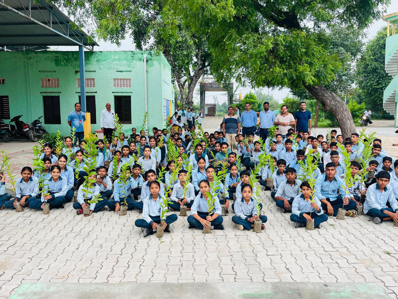 100 plants were distributed to the students under the campaign