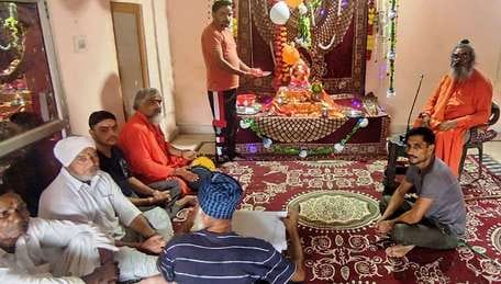 O Ganpati, we worship you.... Devotees danced to the hymn