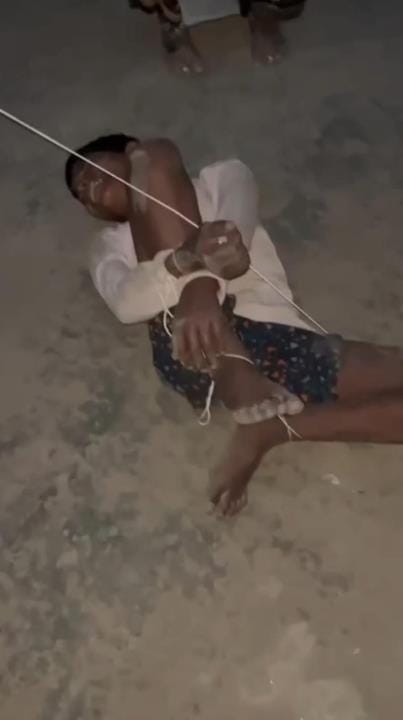 A boy was tied up and beaten with an iron rod on charges of theft