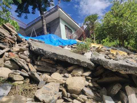 The cowshed in Sagoti village and the retaining wall in Durgapur collapsed