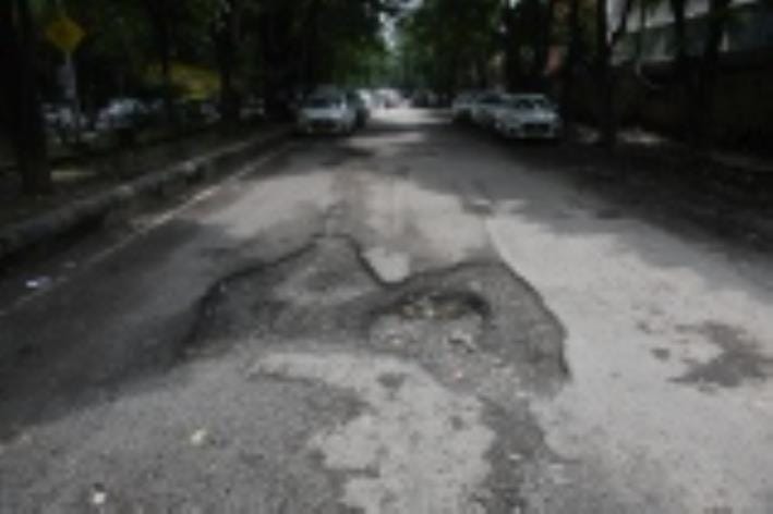 There are more potholes in the city and less budget to fill them
