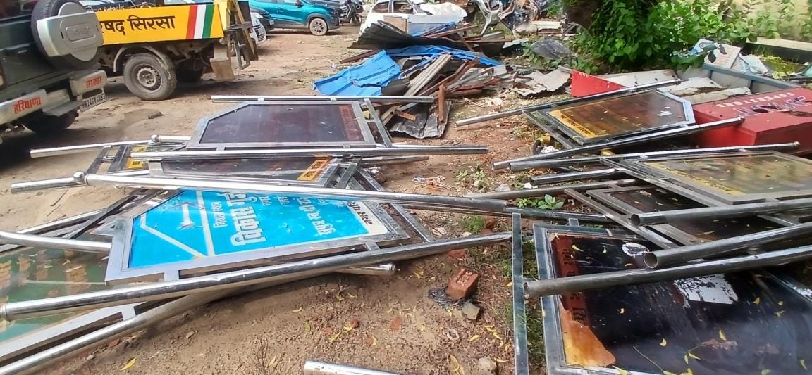 Sign boards from the residences of former councillors were uprooted and thrown into the junk