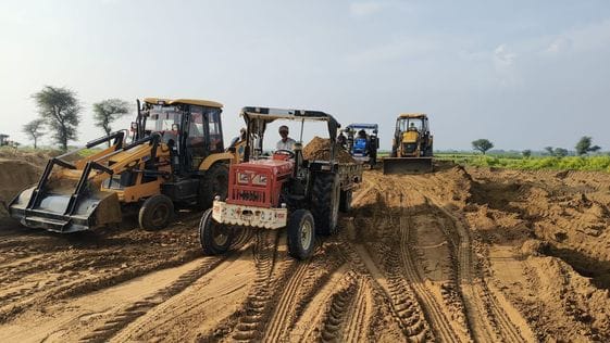 Villagers are building a dam around Bhaini Surjan to save it from floods