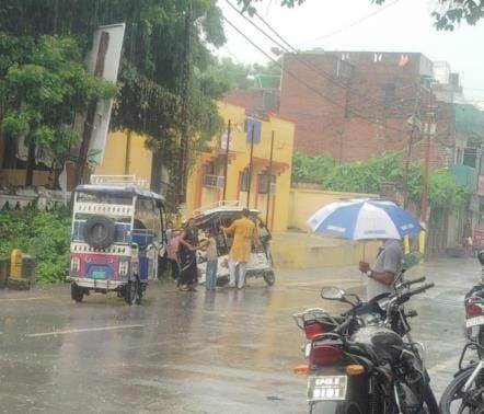 Due to heavy rains, drains overflowed and roads became flooded