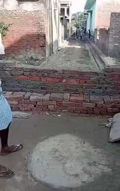 A wall was built in front of the house of a Dalit family
