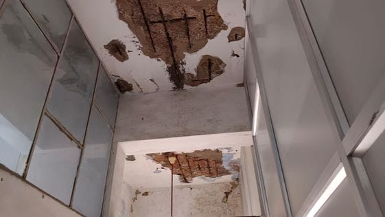Plaster fell from the roof of the old building of the hospital