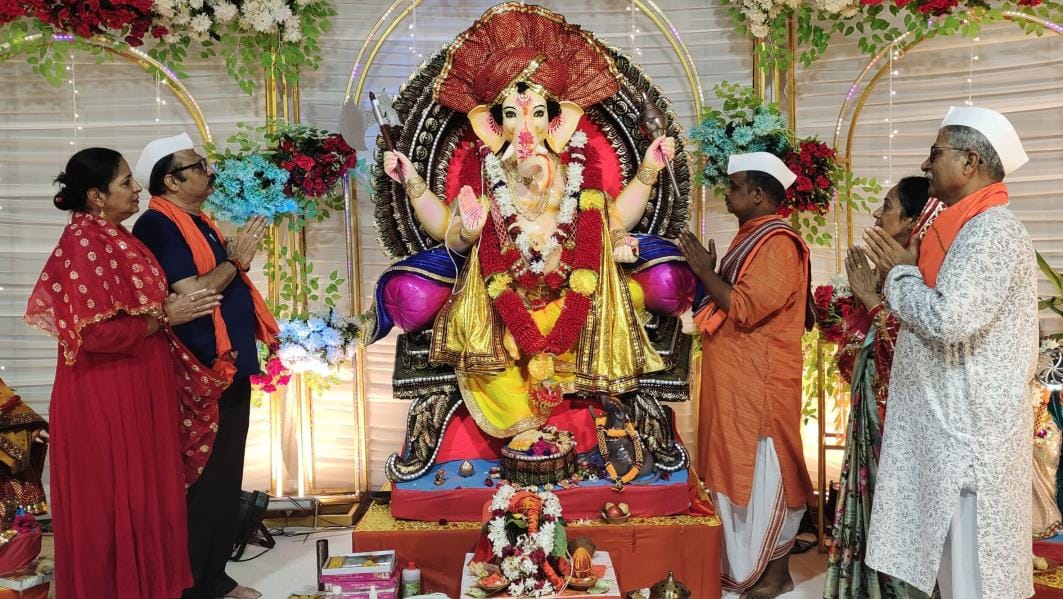 Bowed head in the court of Ganpati Bappa