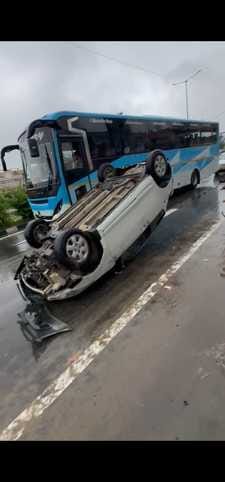 Swift car overturns after hitting divider on highway