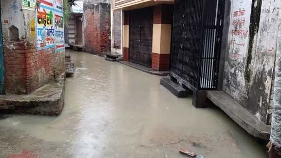 Due to continuous rain, farms and barns are submerged