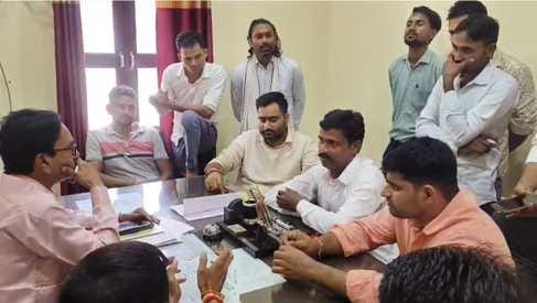 Villagers sit on dharna in protest against breaking of passenger shed and selling of iron rods