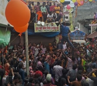Crowd gathered for Dahi-Handi competition held in rain
