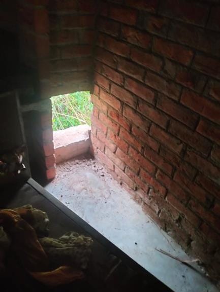 Jewellery and cash stolen by breaking into wall