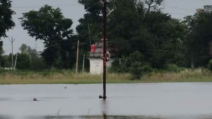 electricity workers got down in 10 feet deep water and restored the 33 KV line