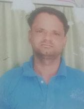 Driver repairing car dies in a vehicle accident