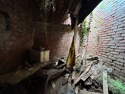 Damage due to roof collapse of three houses in rain