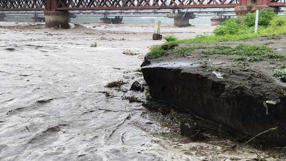 Yamuna's fierce form, cremation ground submerged in water