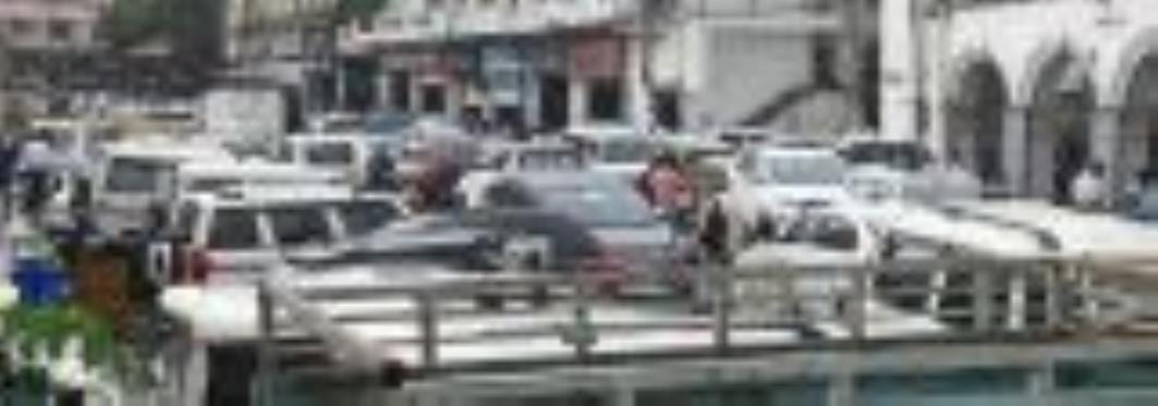 Encroachment causes jam in front of corporation headquarters