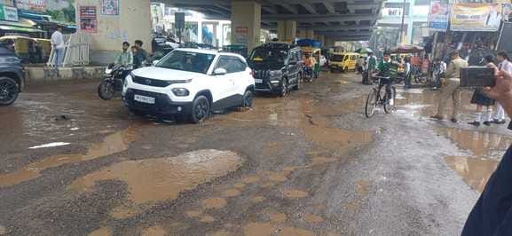 It is difficult to walk on the Delhi-Meerut road because of potholes