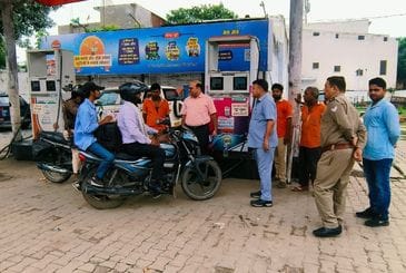Officers came to enforce the 'No helmet-no fuel' campaign