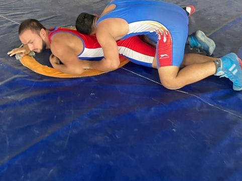 Wrestlers are sweating to win medals in state level wrestling