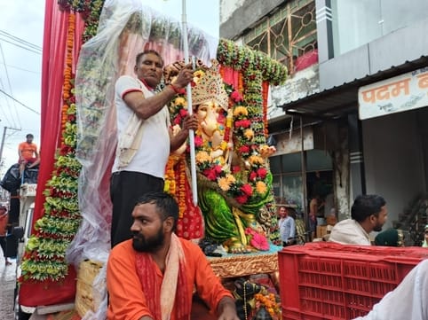 Ganesh immersion was done with drums and trumpets
