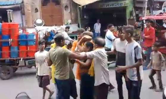 A woman involved in the immersion procession beat up the youths