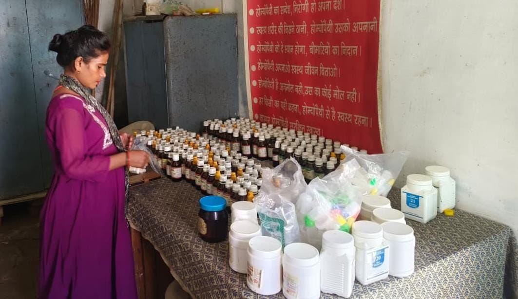Doctor is absent, fourth class worker is distributing medicine