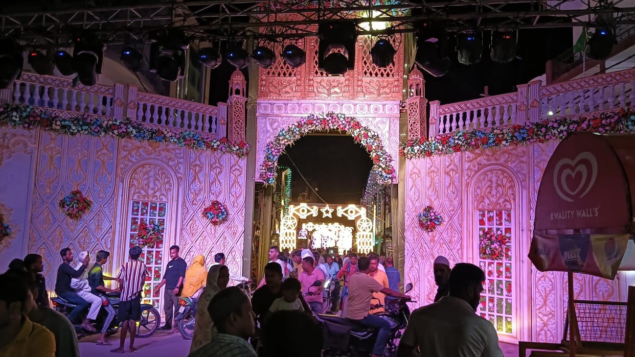 The city is lit up with colorful lights, a procession will be held today