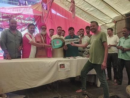 Chanchal Bisht wins an electronic scooty in the lucky draw