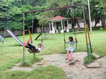 The swings were repaired and the park was buzzing again.