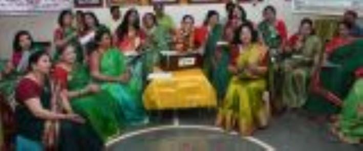 Women dance to folk songs