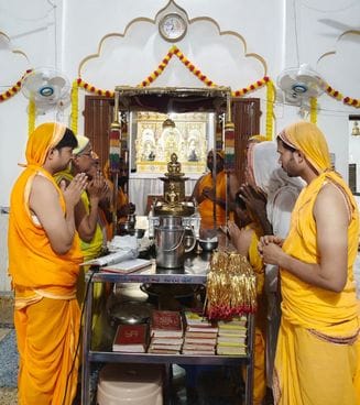 By giving up, non-violence and attachment diminishes
