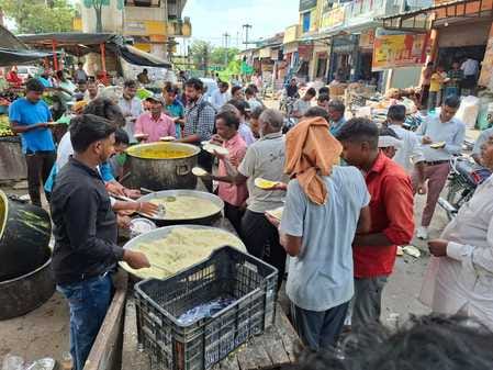 Prasad was distributed to passersby in the storehouse