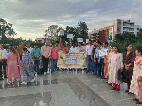 Angry teachers protested by taking out a candle march